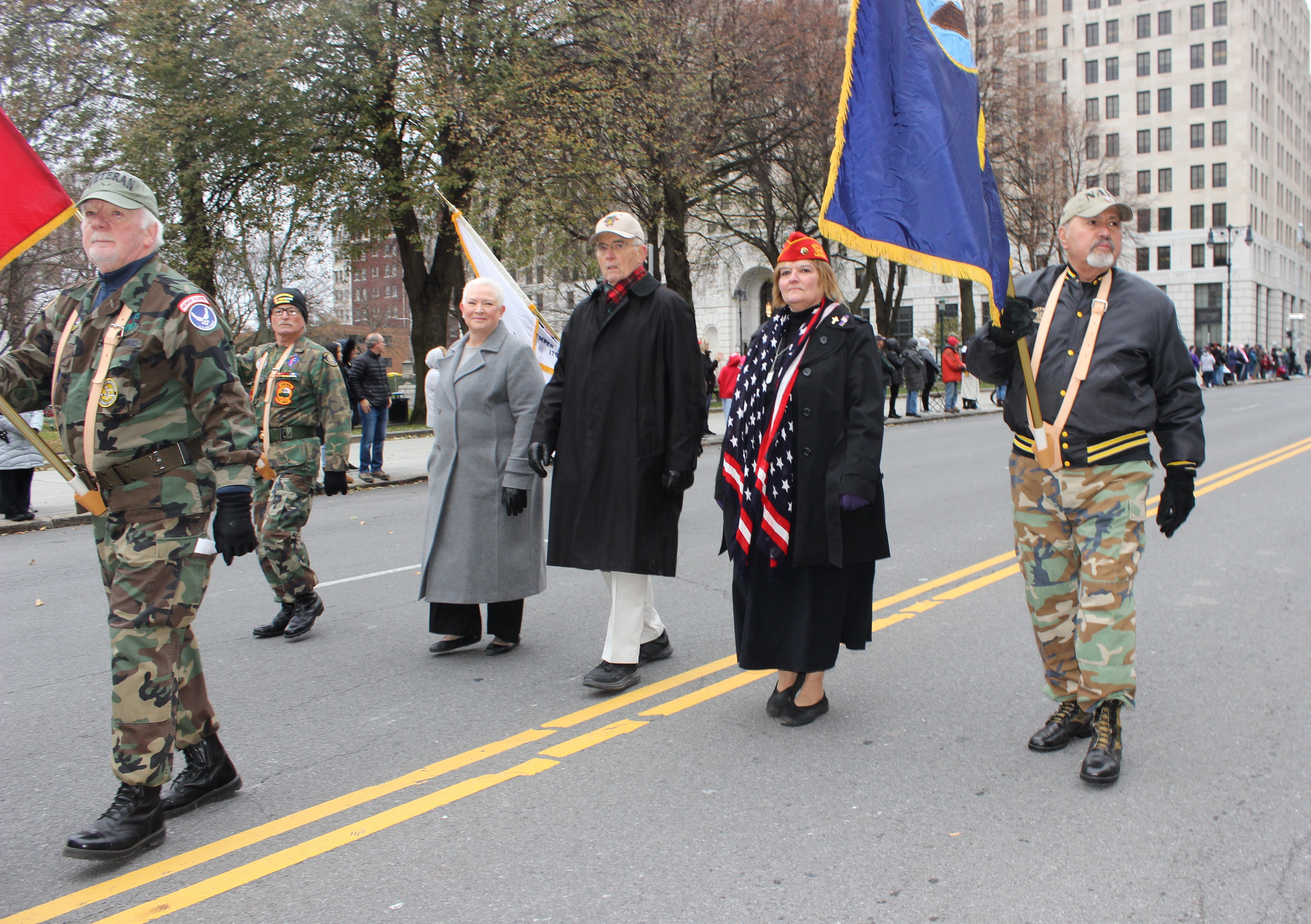 Tri-County Council Vietnam Era Veterans Members in Parade wearing camouflage